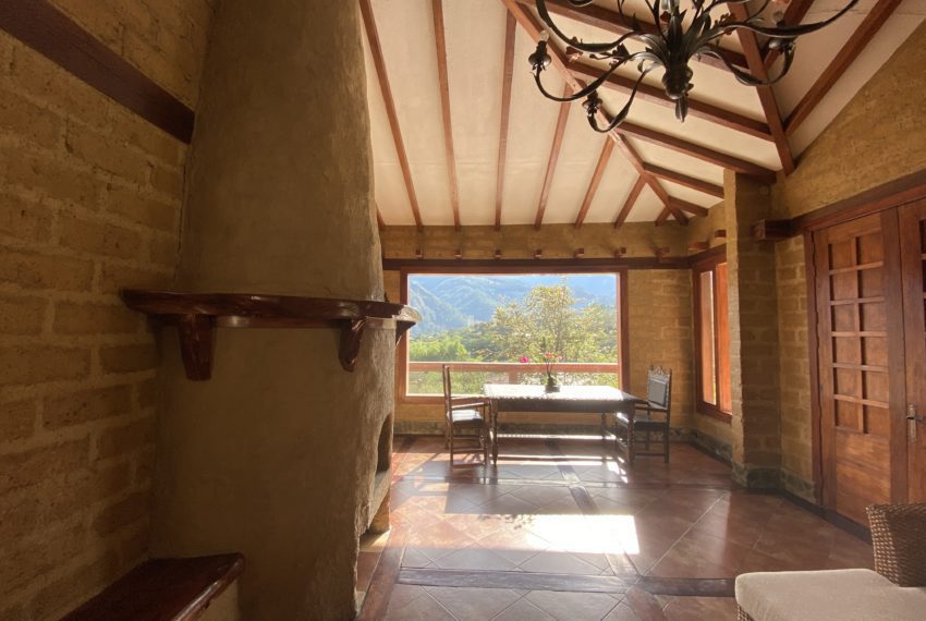Gorgeous home made of adobe, river rock, and wood, located at the gated community called El Atillo in Vilcabamba